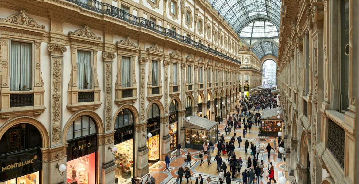 people shopping at galleria vittorio emanuele ii in milan