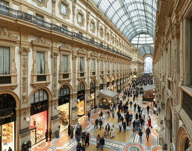 people shopping at galleria vittorio emanuele ii in milan