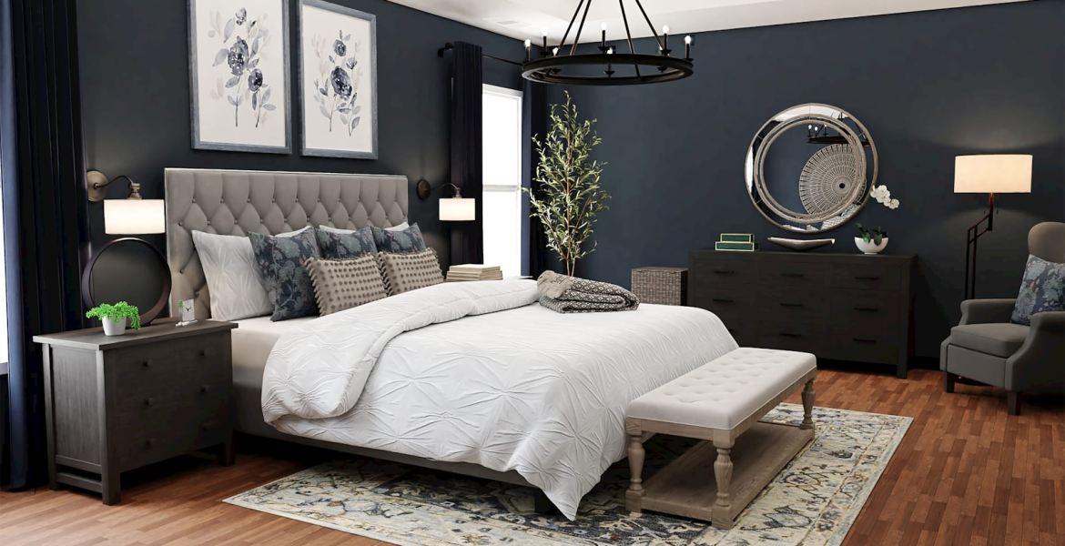 a bedroom with blue walls and a large bed