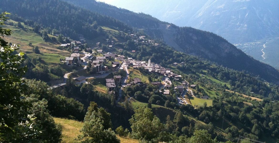 Scenic village nestled in mountainous landscape