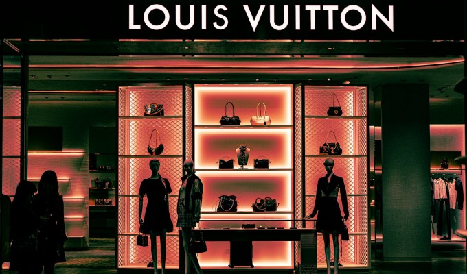 Louis vuitton store with mannequins and handbags