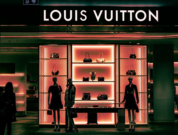 Louis vuitton store with mannequins and handbags