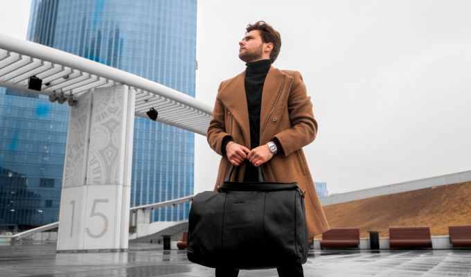 a man holding a briefcase