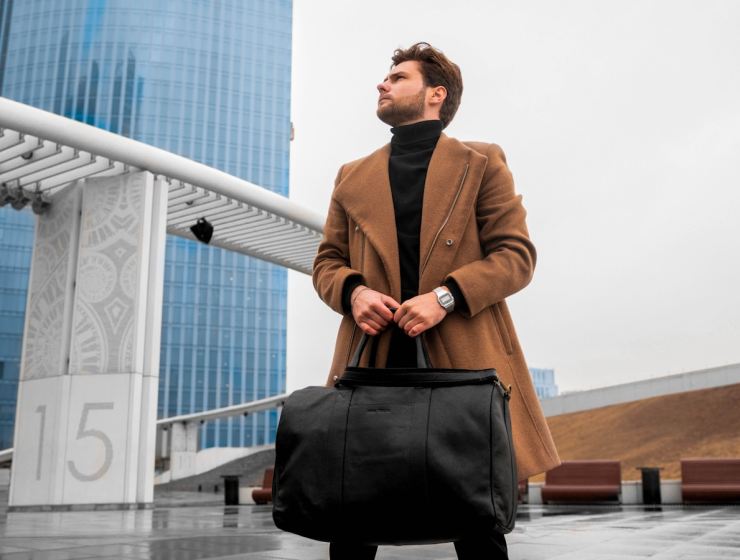 a man holding a briefcase