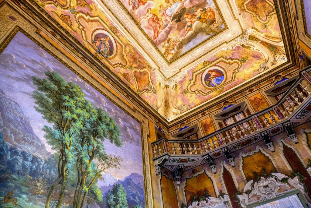 a painting on the ceiling of a building