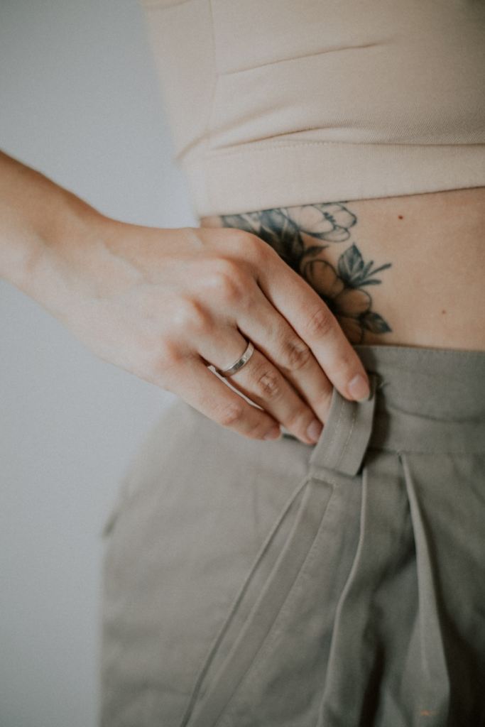 person in gray denim bottoms