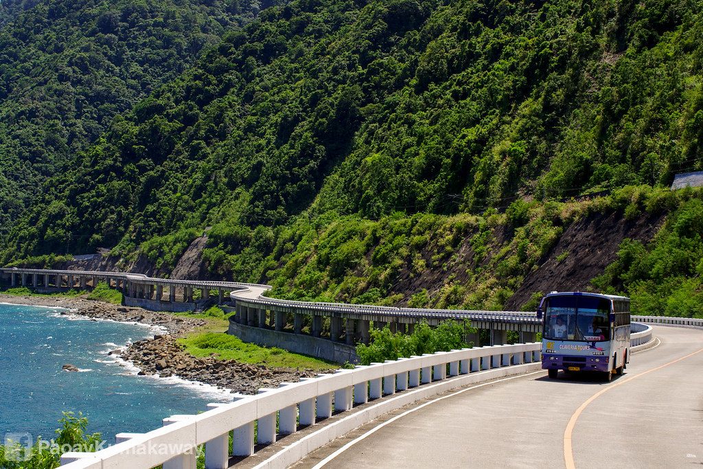 Bus on road at Patapat Viaduct, Philippines