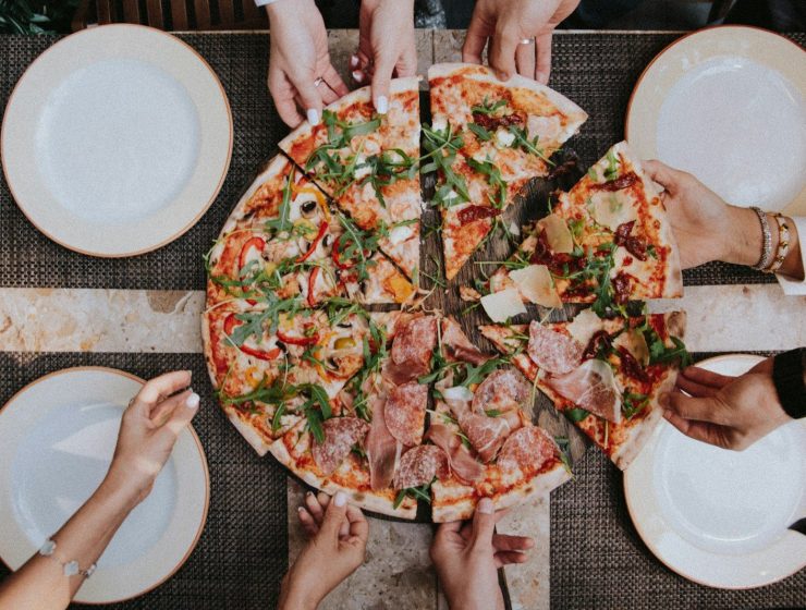 pizza on white ceramic plate