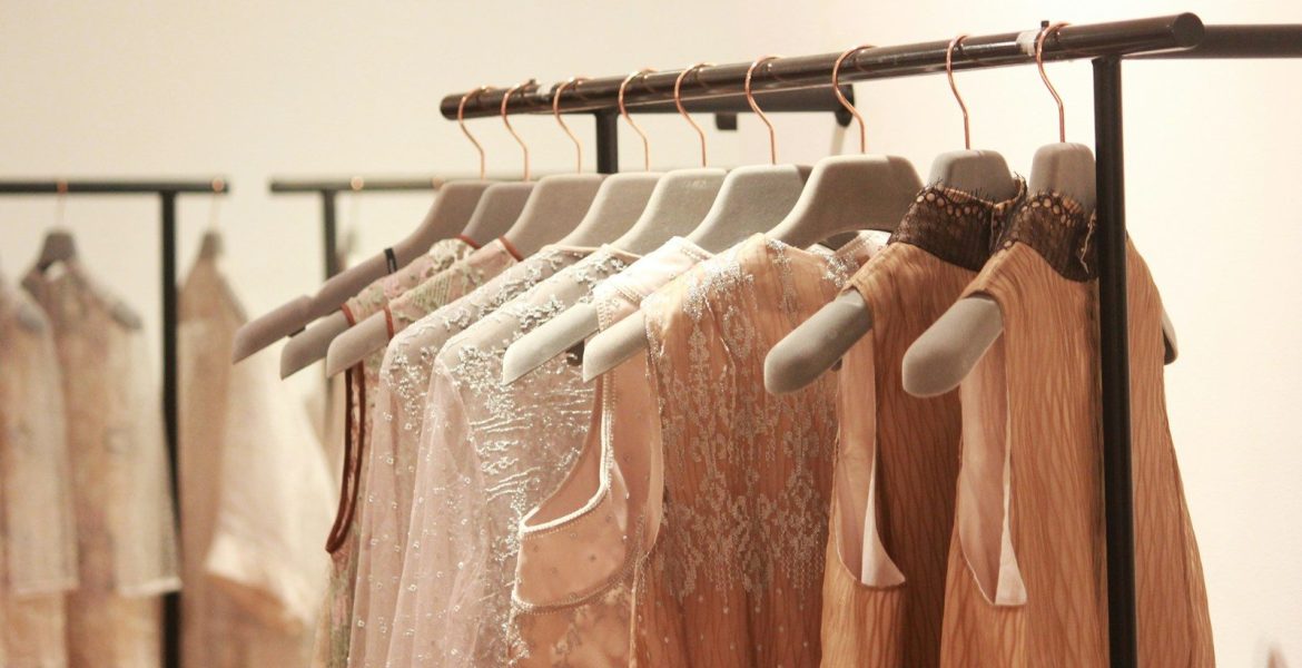 shooping- assorted tops hanging indoors