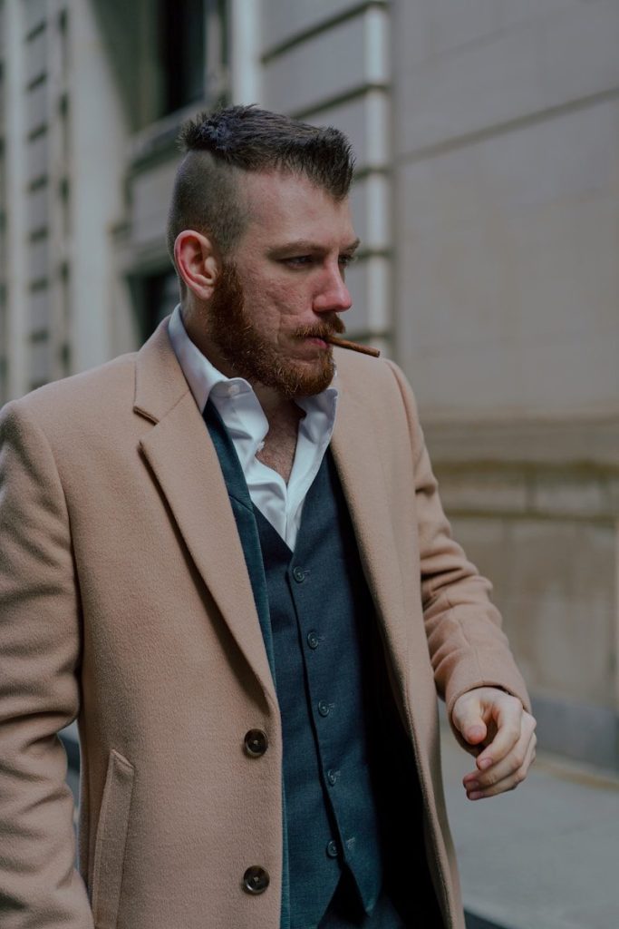 man in brown suit jacket