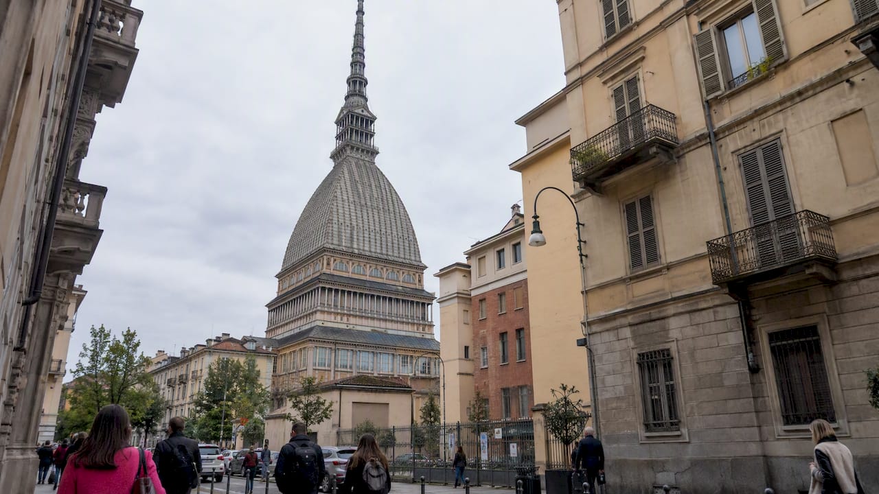 Mole Antonelliana rising above Turin rooftops