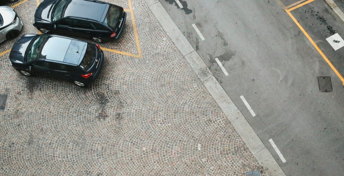 a group of cars parked in a parking lot