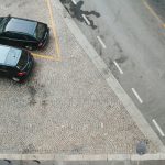 a group of cars parked in a parking lot