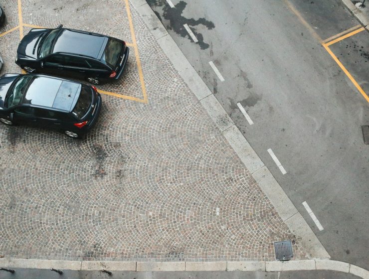 a group of cars parked in a parking lot